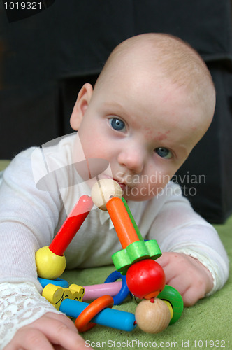 Image of Toddler with rattle