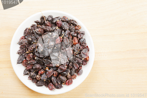 Image of Barberries spice on wood