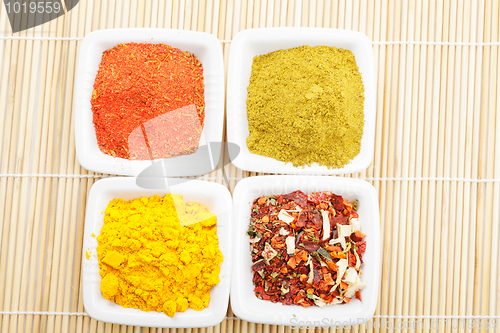 Image of Choice of spices on mat above view