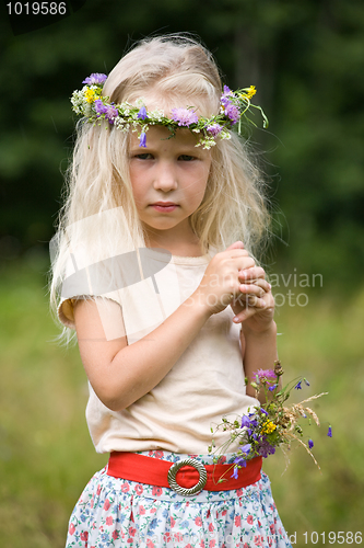 Image of girl in wild flowers wreath