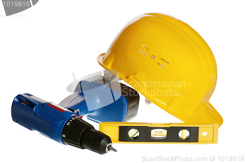Image of Tools and helmet of the builder, it is isolated on white