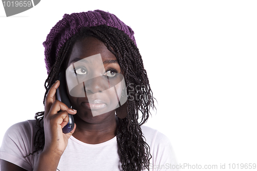 Image of African woman talking on the telephone