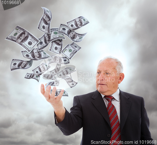 Image of Businessman holding something