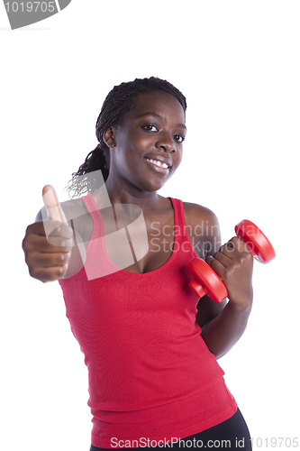 Image of Wealthy african woman exercising