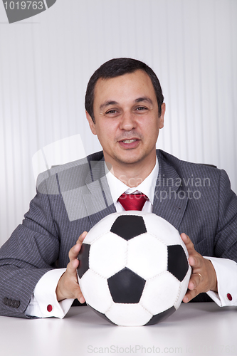 Image of Soccer manager at the office