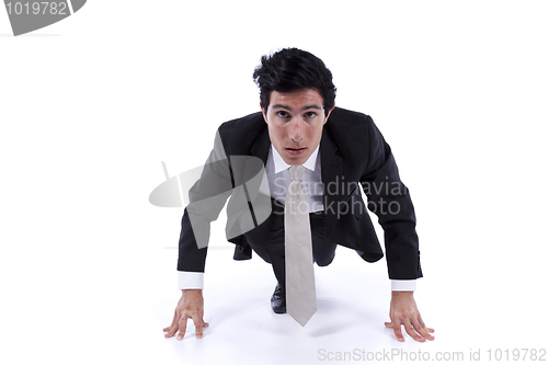 Image of Businessman ready to start running