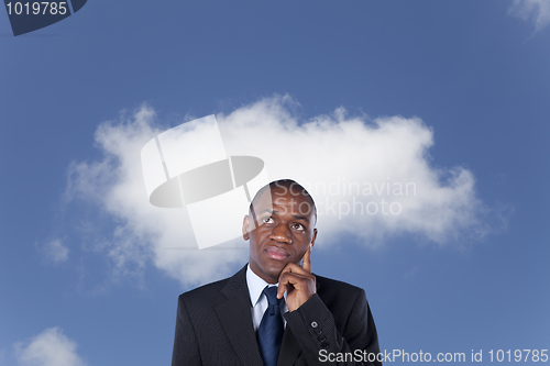 Image of African businessman thinking