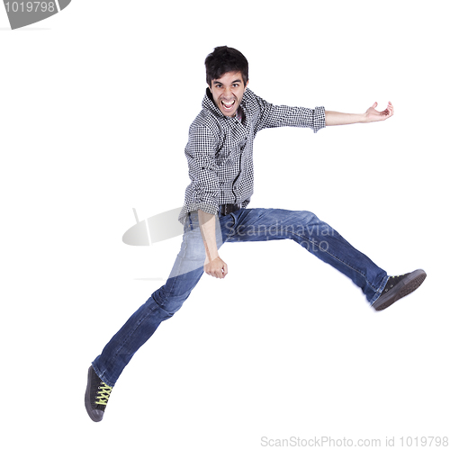 Image of Happy young man jump