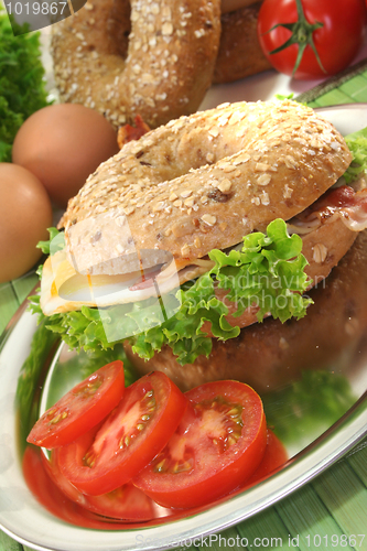Image of Bagel with fried egg and bacon