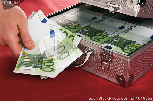 Image of suitcase with money