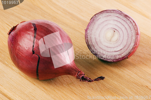 Image of Bulb on a wooden kitchen board