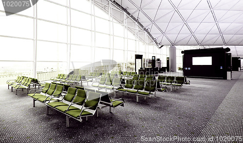 Image of airport terminal boarding gate area