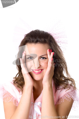 Image of girl with hands near her face