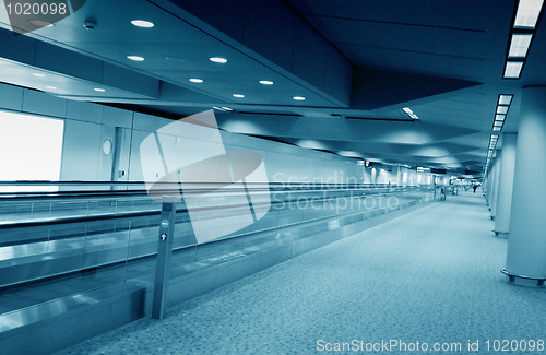 Image of airport boarding gate moving walkway
