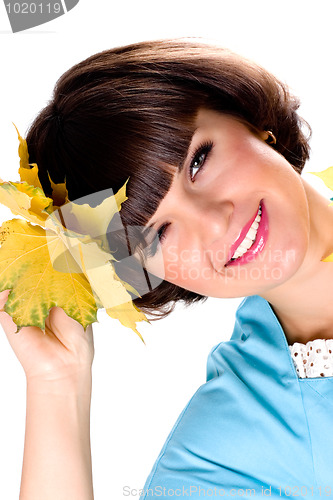 Image of woman with yellow leaves