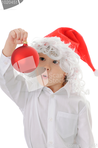Image of child in a hat santa claus