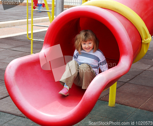 Image of The girl on the playground