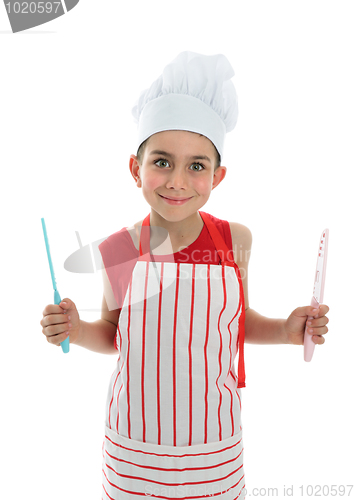 Image of Chef holding two knives