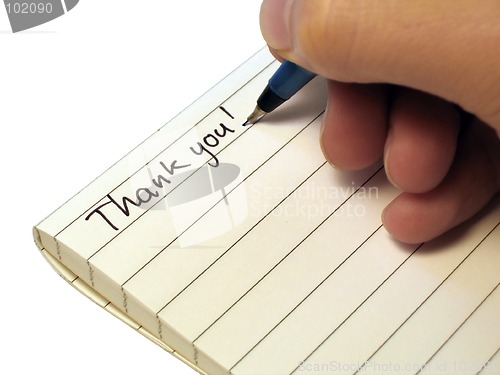 Image of Note book, someone writing 'Thank You!'