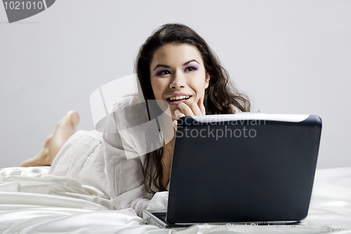 Image of Working on the bed