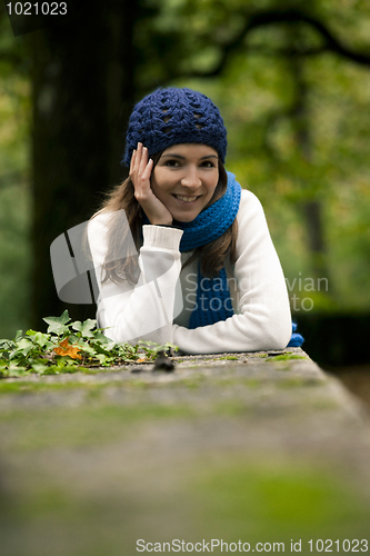 Image of Beautiful young woman in nature