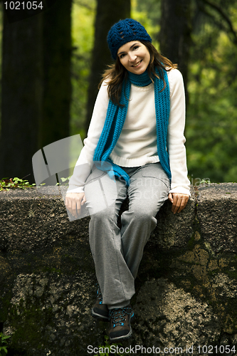 Image of Happy young woman in nature