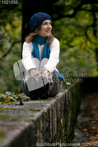 Image of Happy young woman in nature