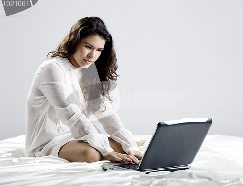 Image of Working on the bed