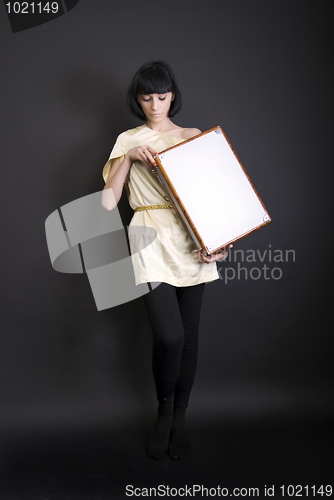 Image of A girl with suitcase 