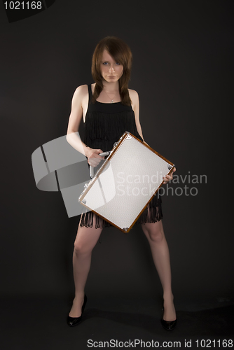 Image of A girl with suitcase   