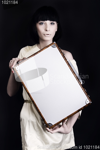 Image of A girl with suitcase   