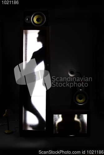 Image of A girl behind the glass door           