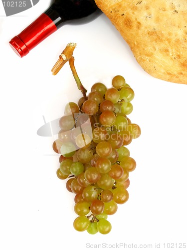 Image of muscat grapes, wine bottle and bread