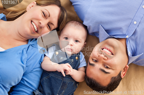 Image of Mixed Race Family Playing on the Blanket