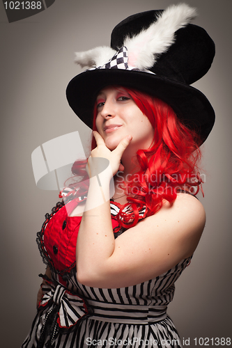 Image of Attractive Red Haired Woman Wearing Bunny Ear Hat