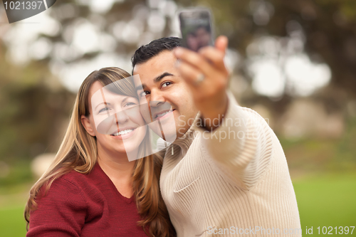 Image of Attractive Mixed Race Couple Taking Self Portraits