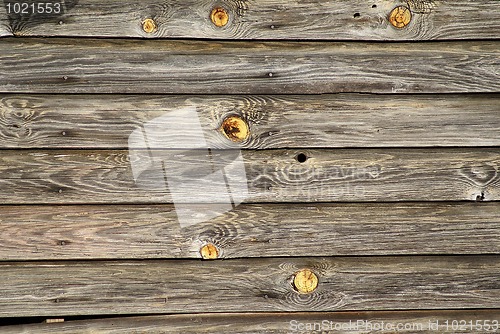 Image of Plank wall with knots