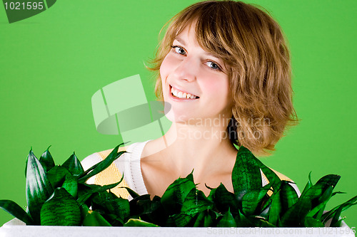 Image of  happy girl with plants