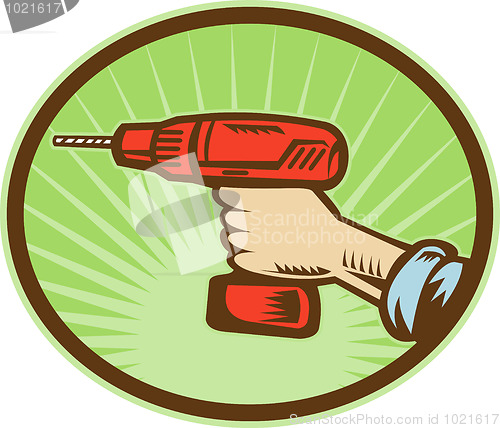 Image of Hand holding a cordless drill