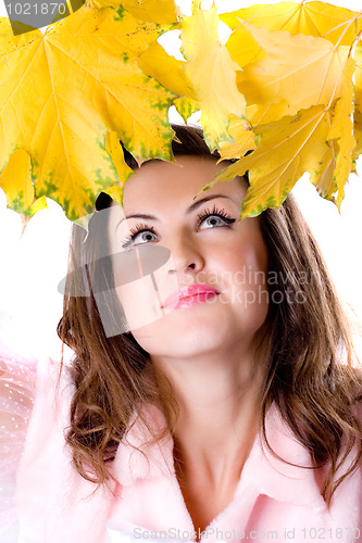 Image of woman with yellow leaves 