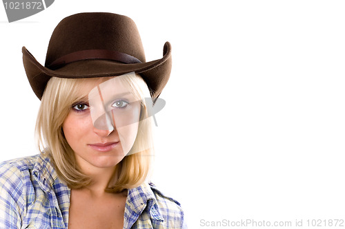 Image of pretty western woman in cowboy shirt and hat