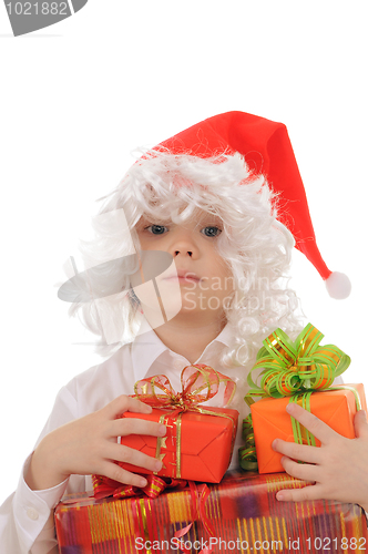 Image of child in a hat santa claus