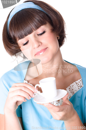Image of woman enjoying a cup of coffee 