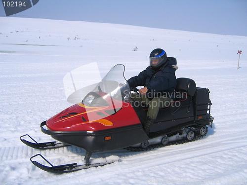 Image of Riding snowmobile