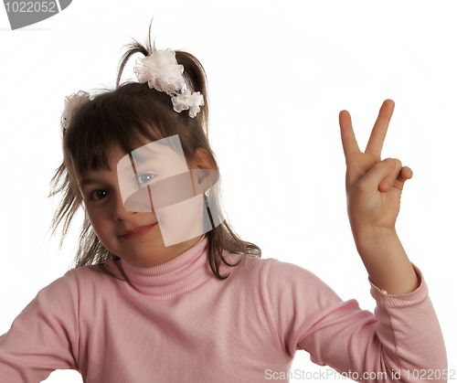 Image of Young girl show v-sign