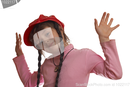 Image of Smiling girl with two hands up