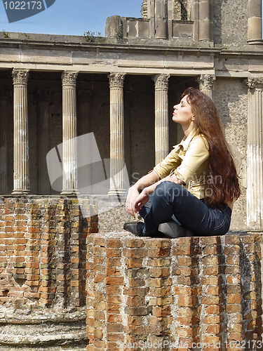 Image of Young woman looking into the light