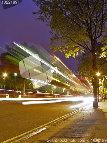 Image of Red bus arriving