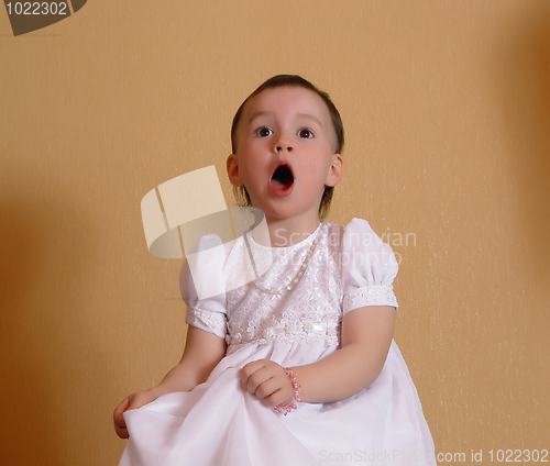Image of Girl singing in a pink dress