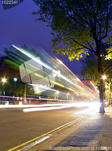 Image of Red bus arriving